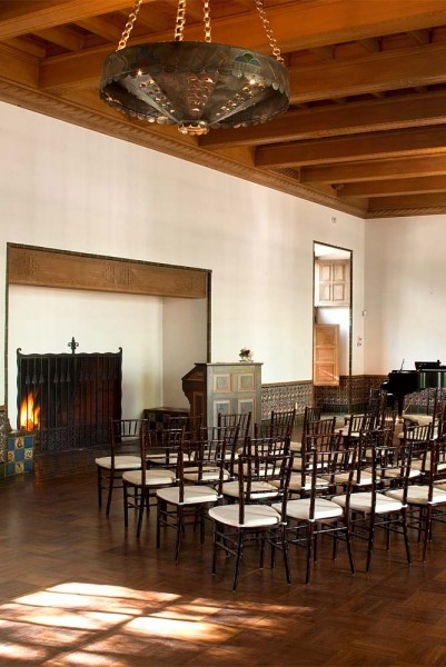 Inside the 1934 La Quinta ballroom with chairs set up for a lecture